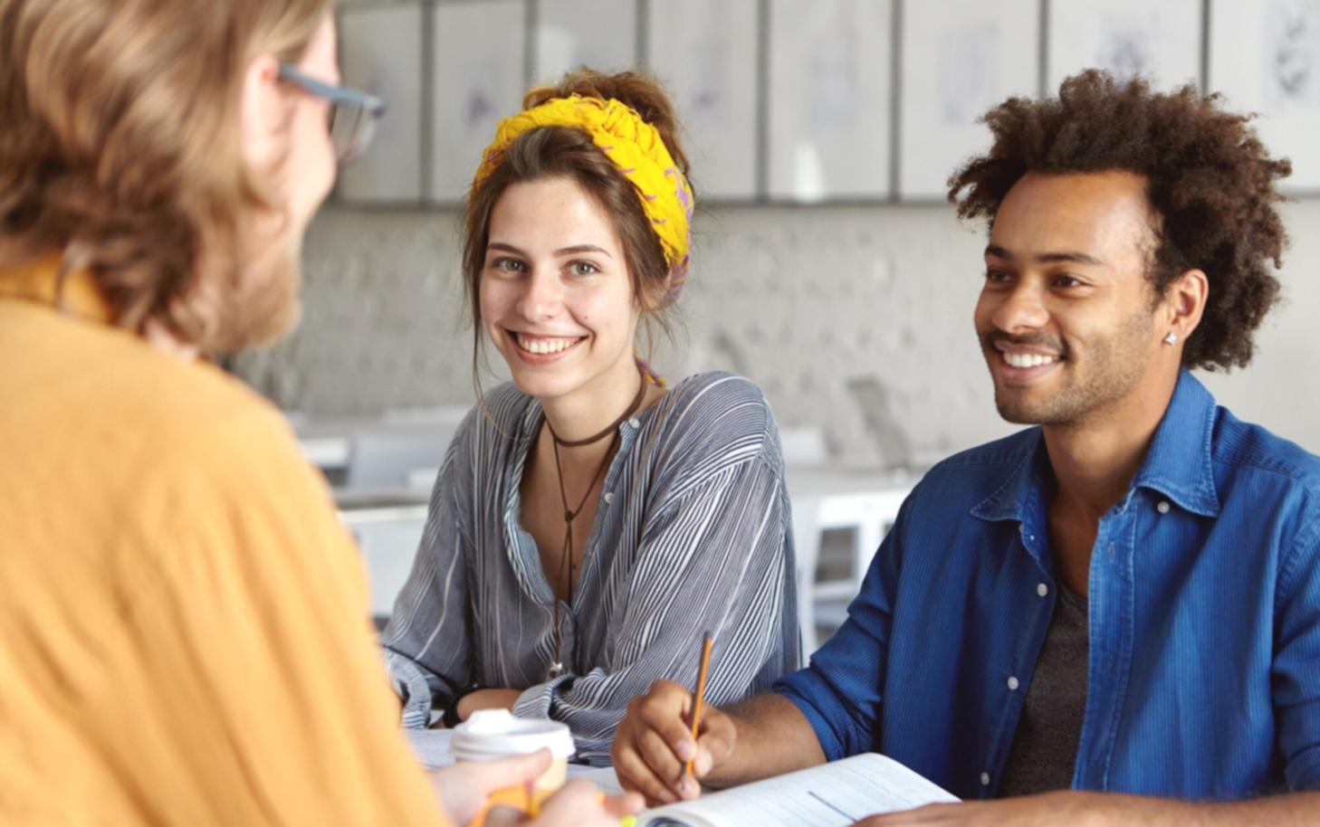 Business planning session materials with financial charts and growth strategies